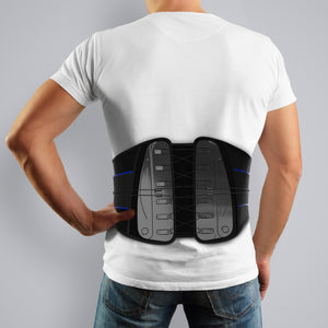 Man wearing TREK HEALTHY Cross-Pull Platinum Core and Back Support, back view